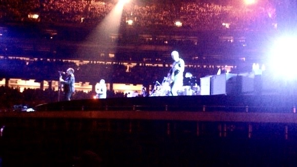 The four members of U2 onstage in Atlanta on the 360 tour. The image quality is poor.